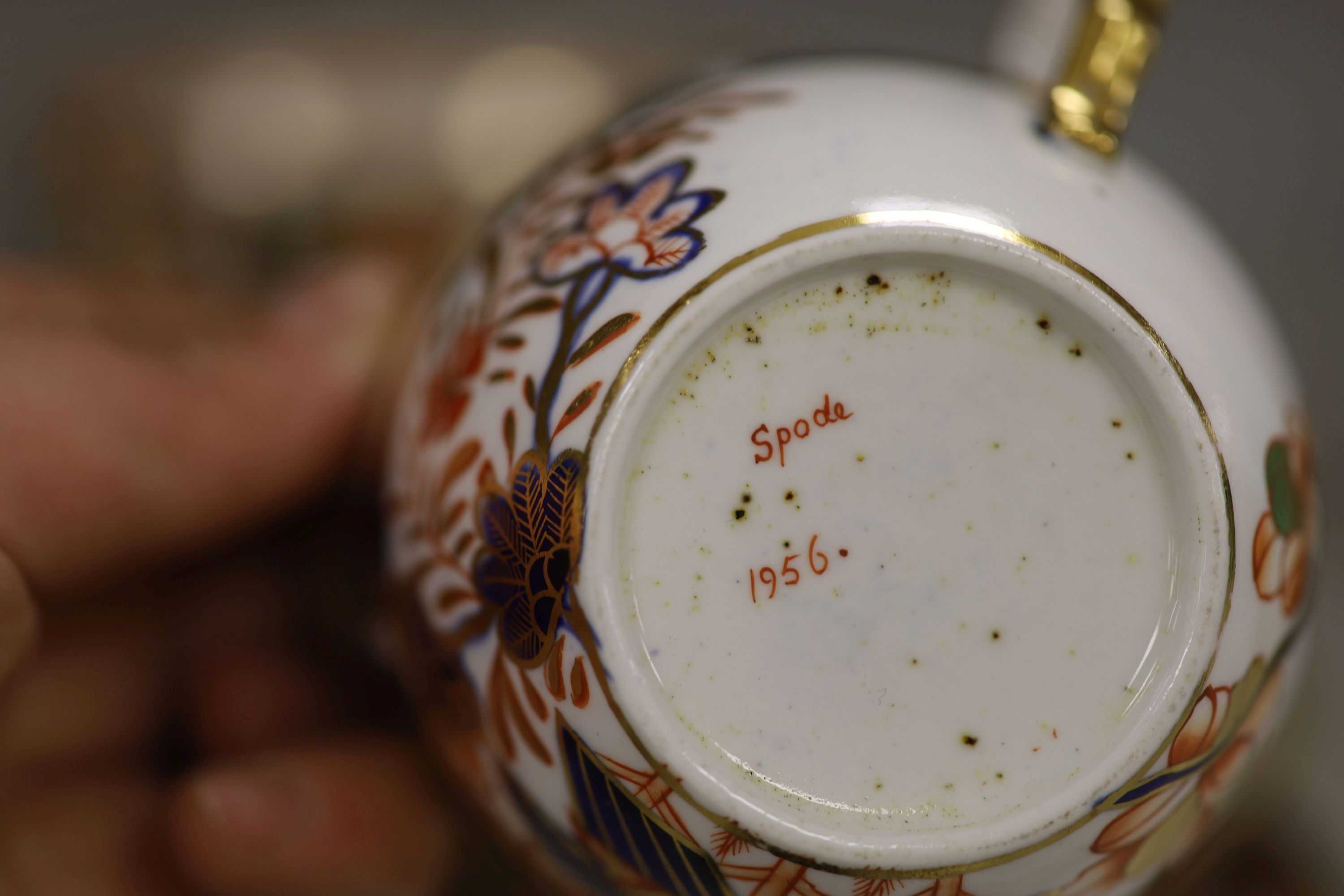 A Spode part tea service painted in imari style with pattern 1956,